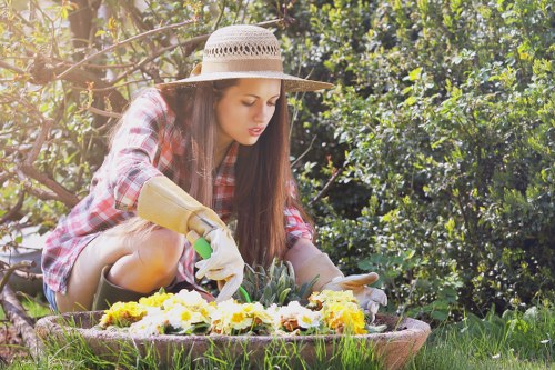 Professional gardeners preparing plants for sustainable urban planting