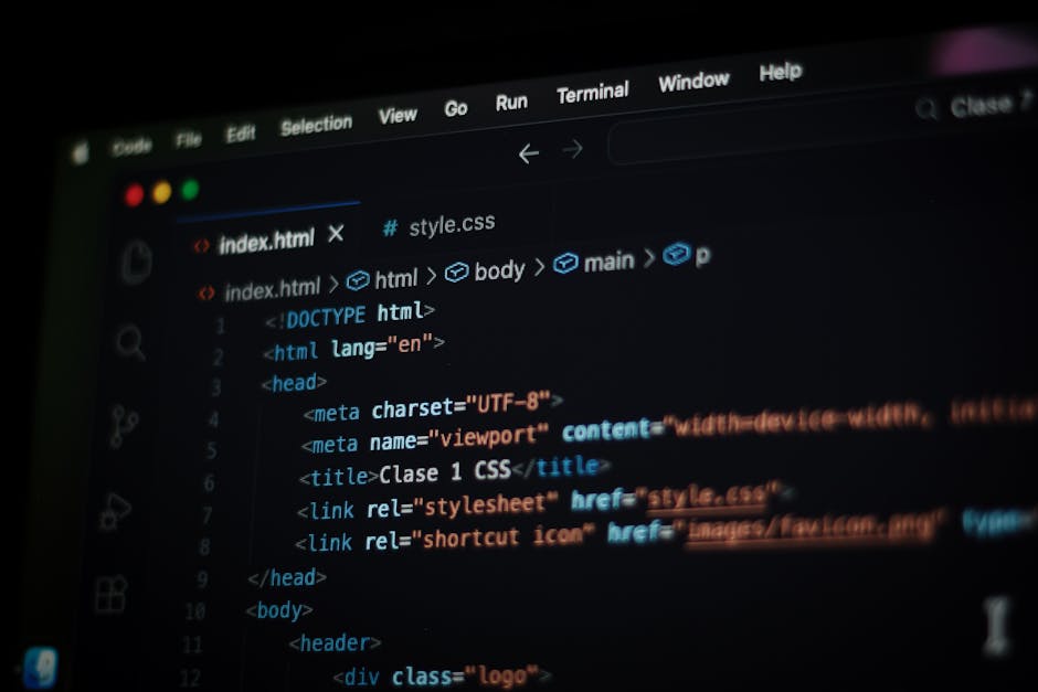 A close-up image of a computer screen displaying the HTML code for a webpage. The code includes tags such as <!DOCTYPE html>, <html>, <head>, <title>, and <link>, with some portions highlighted in dif
